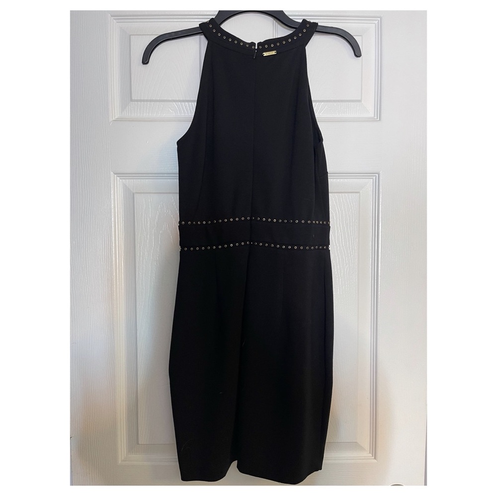 GUESS size medium black halter dress with gold and black studs. Worn once